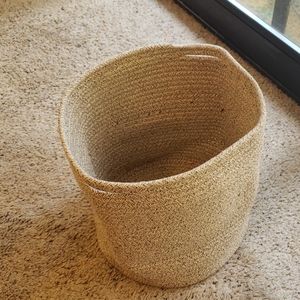 Tan basket or plant pot cover